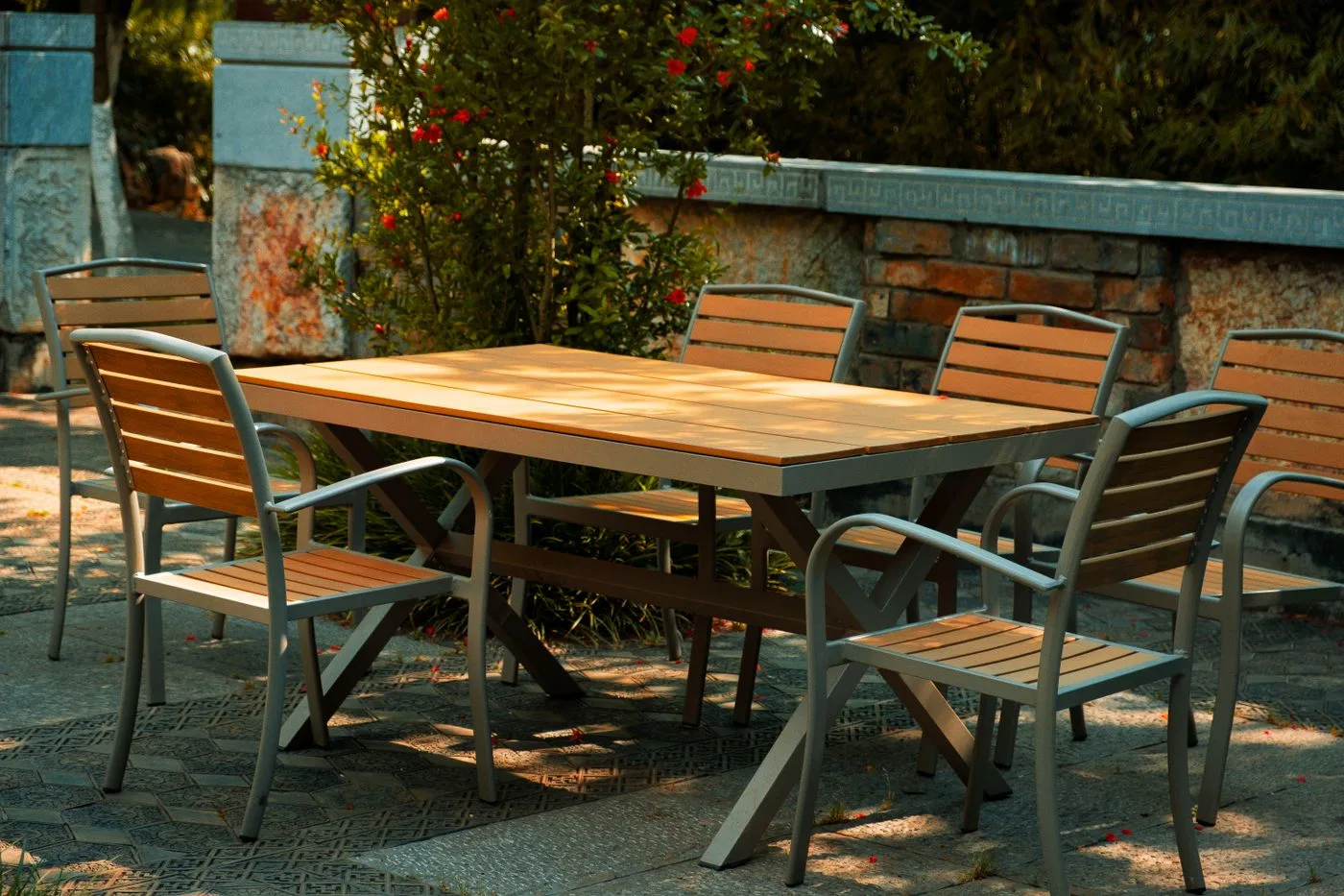 Outdoor Patio Table with Wooden Chairs in Garden
